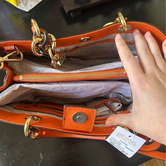 Michael Kors Cynthia purse in color Tangerine- NWT